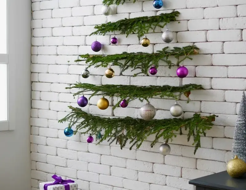 Cozy Wall Mounted Christmas Tree on White Brick | Winter Home Decor
